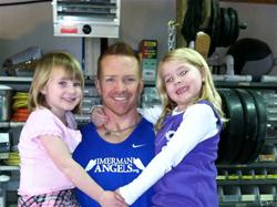 John with his two daughters